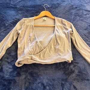 Brand new, never worn Senita Athletics ballet wrap top, size M.